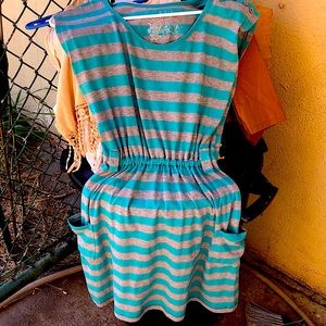 Casual fit gray and teal stripped sleeveless dress with pockets.